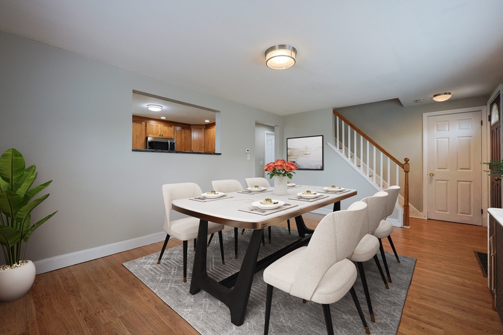 20 Kent Street Saugus, MA 01906 - Photo 3 of 41 a view of a dining room with furniture and wooden floor