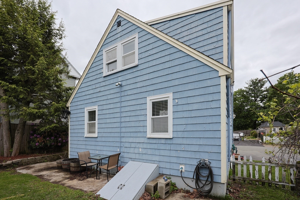20 Kent Street Saugus, MA 01906 - Photo 34 of 41 a backyard of a house with seating space