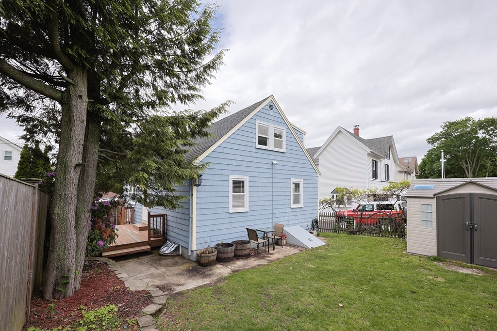 20 Kent Street Saugus, MA 01906 - Photo 38 of 41 a view of a small house in the back yard