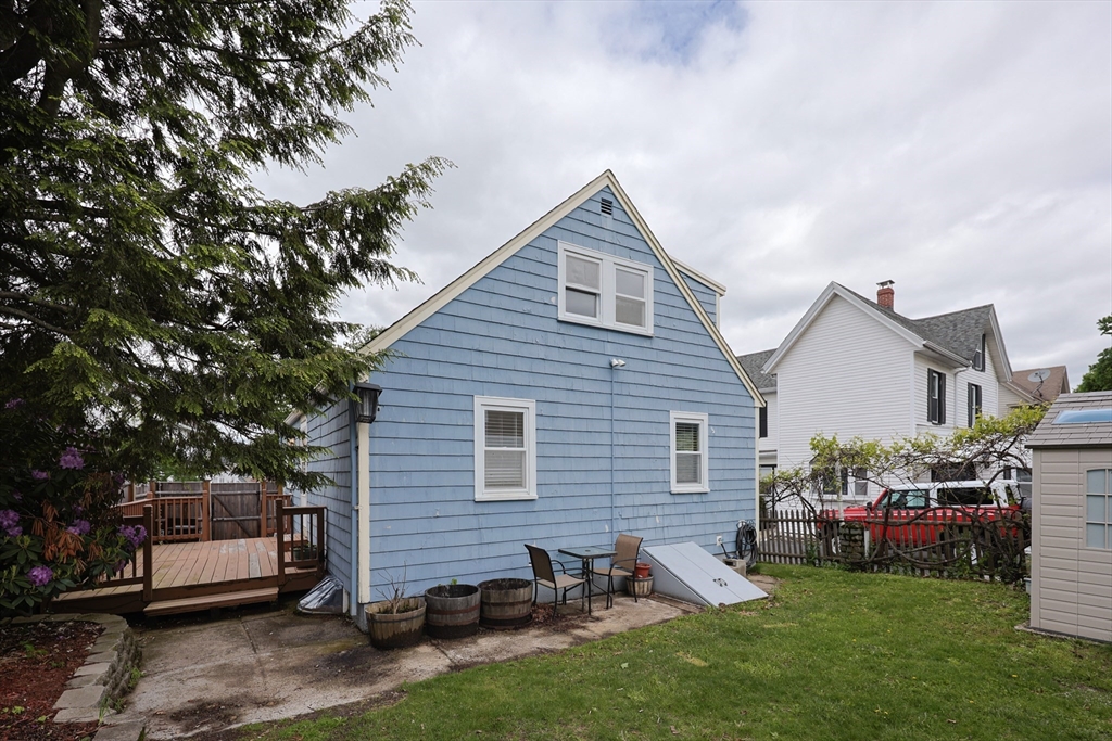 20 Kent Street Saugus, MA 01906 - Photo 40 of 41 a view of backyard of house with outdoor seating