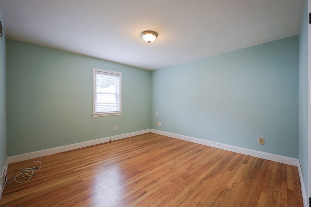 20 Kent Street Saugus, MA 01906 - Photo 10 of 41 an empty room with wooden floor and windows