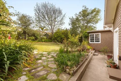 a view of a garden with pathway