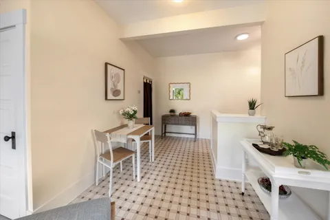 a living room with a couch and a table in it