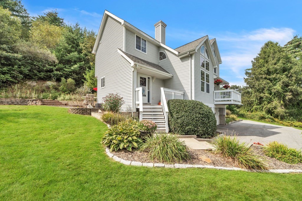121 Fenton Road Monson, MA 01057 - Photo 1 of 40 a view of a house with a yard