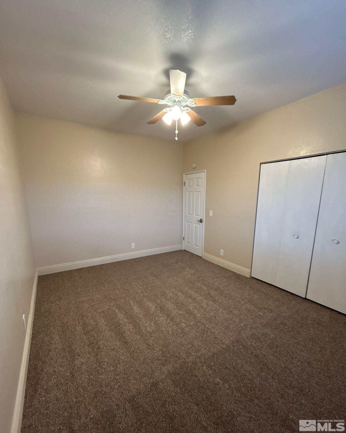480 Sunshine Lane Reno, NV 89502 - Photo 7 of 11 a view of an empty room