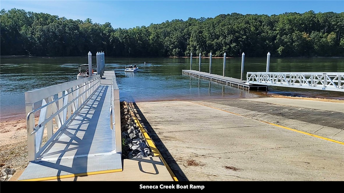 26 Wilbanks Road Seneca, SC 29678 - Photo 22 of 47 This serene waterfront property offers convenient boat access and scenic natural views.