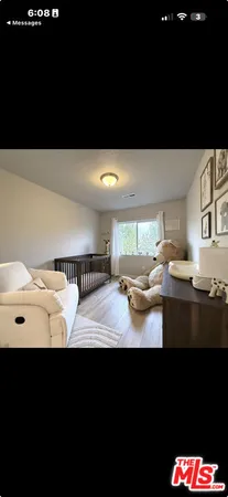 a view of open kitchen with kitchen island and sink