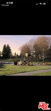 a view of an outdoor space and a lake