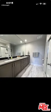 a view of a kitchen with car parked