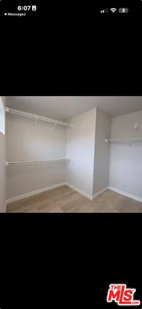 a view of kitchen island with cabinets