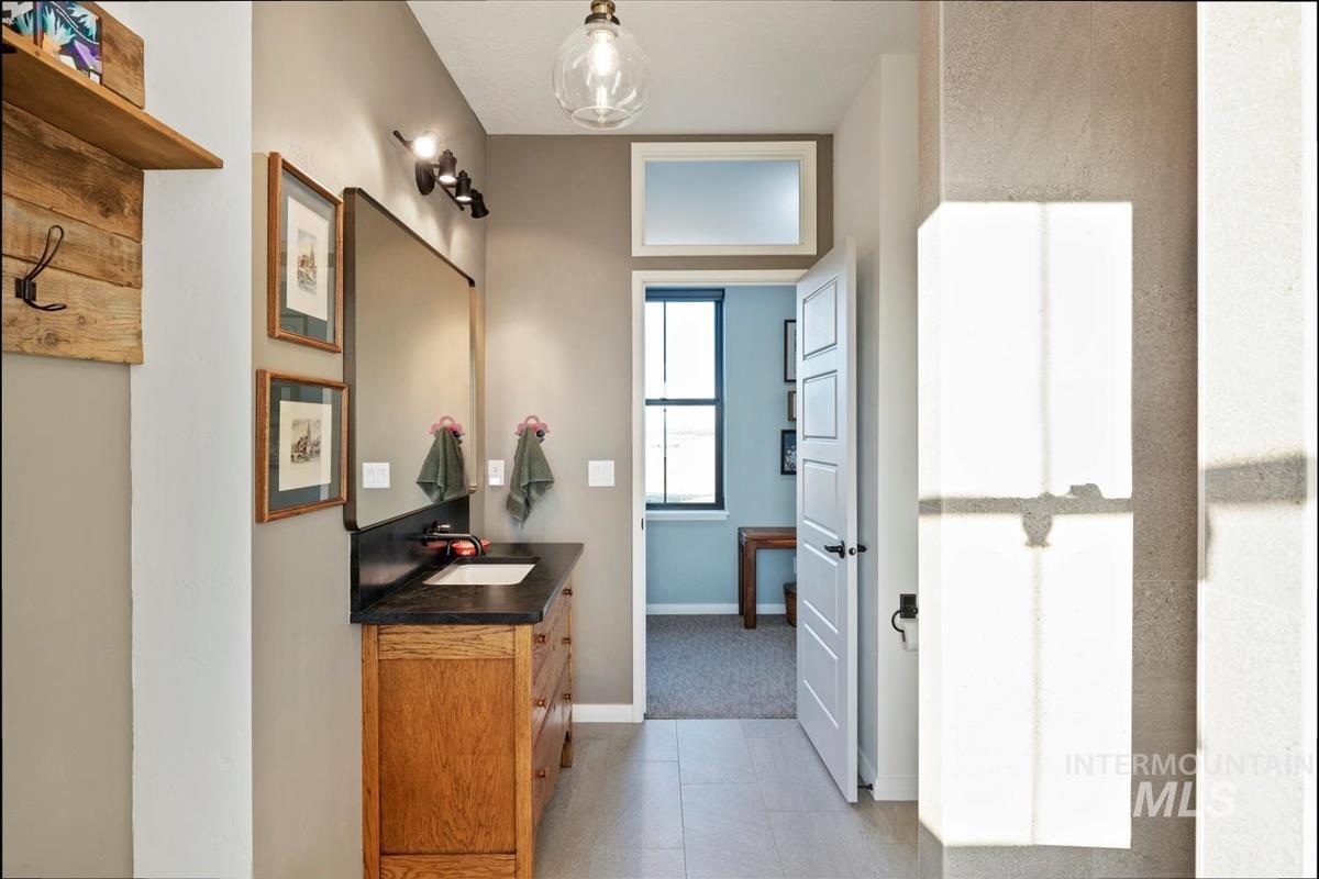 11326 West Rio Road Caldwell, ID 83607 - Photo 29 of 50 Bathroom featuring vanity and light tile patterned floors
