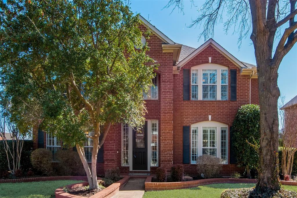 300 South Coppell Road Coppell, TX 75019 - Photo 1 of 1 a front view of a house with a yard