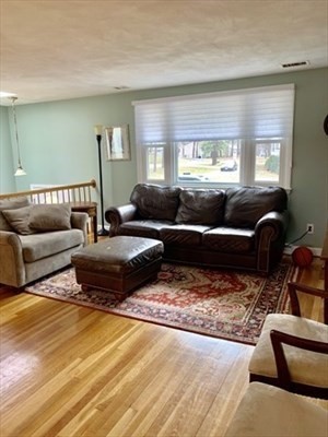 9 Spring Lane Sharon, MA 02067 - Photo 3 of 14 a living room with furniture windows and a wooden floor