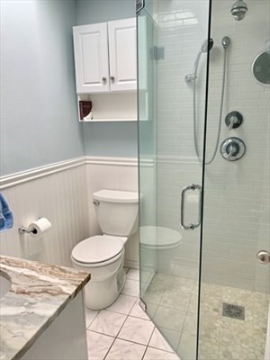 9 Spring Lane Sharon, MA 02067 - Photo 10 of 14 a bathroom with a toilet and a shower