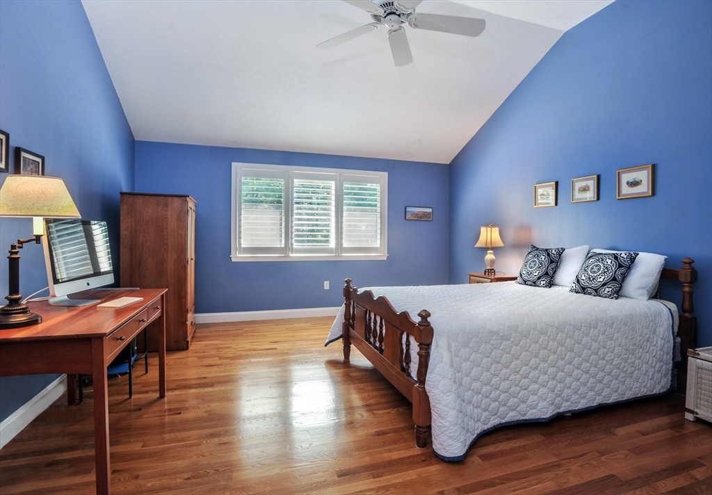 56 Bay Farm Road, Unit 56 Duxbury, MA 02332 - Photo 14 of 20 a bedroom with bed and wooden floor