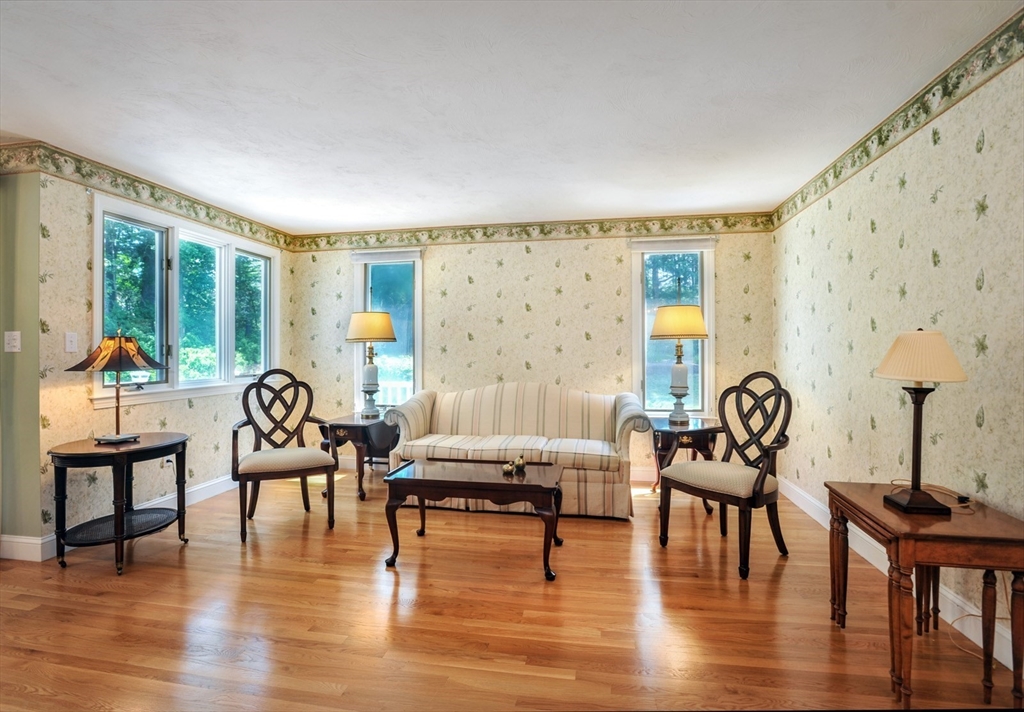 56 Bay Farm Road, Unit 56 Duxbury, MA 02332 - Photo 5 of 20 a living room with furniture and wooden floor