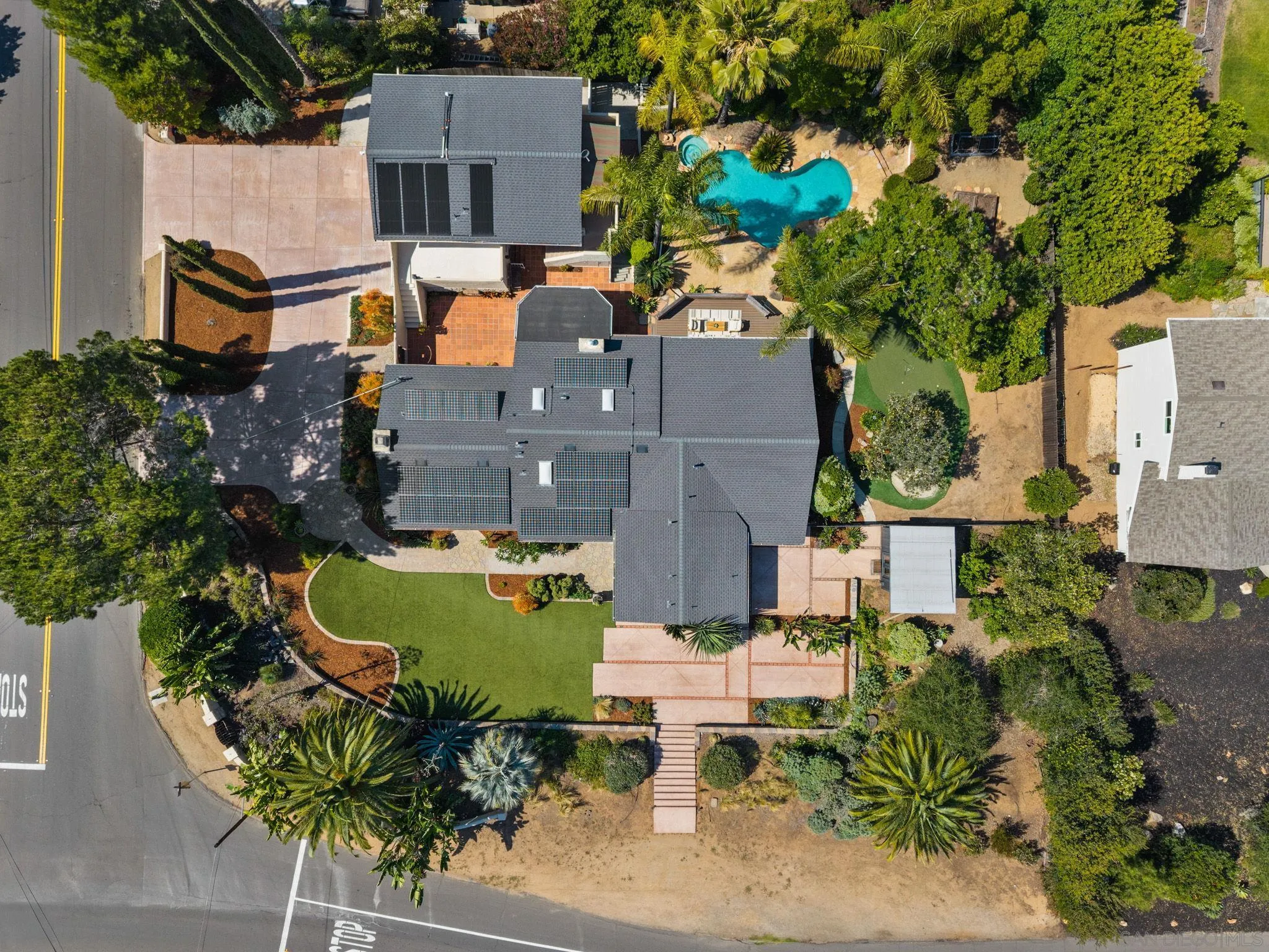 12832 Stone Canyon Road Poway, CA 92064 - Photo 55 of 60 an aerial view of a house with a garden and plants