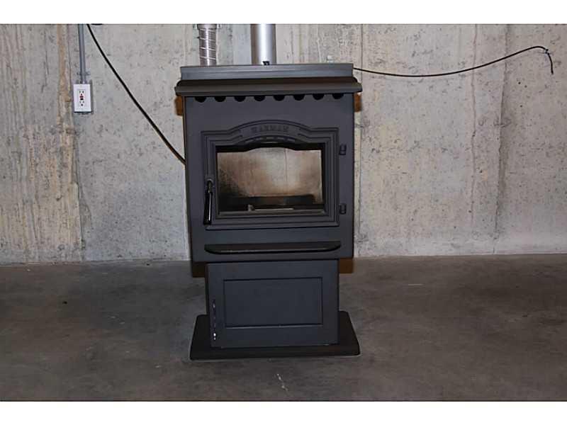 69 Middle Jam Road Standish, ME 04084 - Photo 15 of 21 Other. Pellet stove in basement