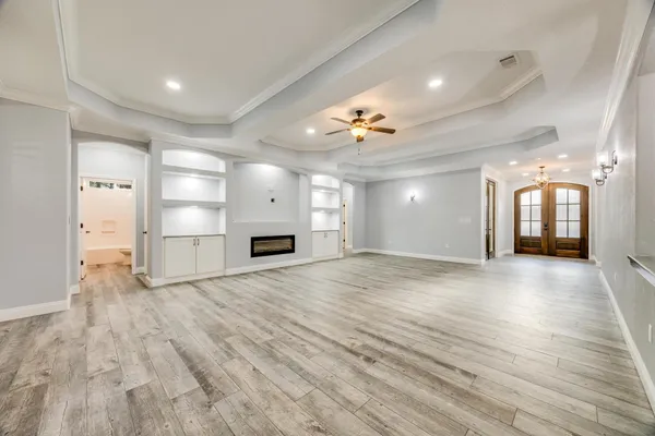 a kitchen with stainless steel appliances granite countertop a sink a stove and a refrigerator