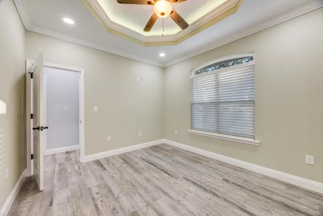 a view of a livingroom with wooden floor