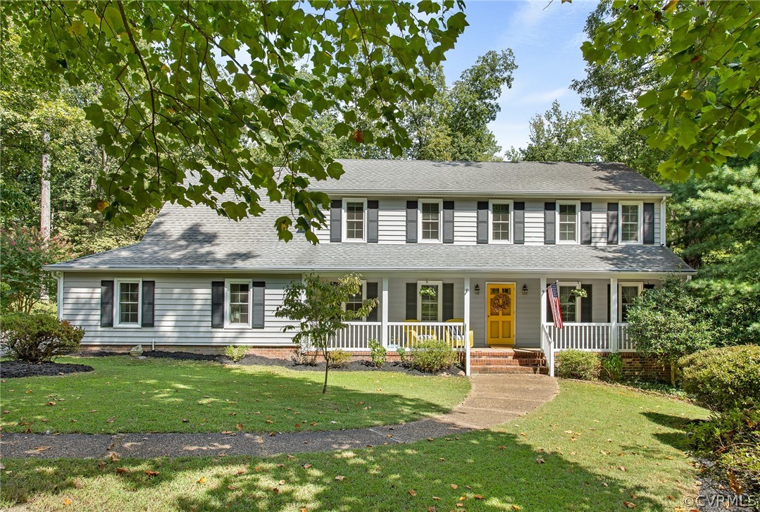1213 Kingscross Road Midlothian, VA 23114 - Photo 1 of 39 a front view of a house with a yard