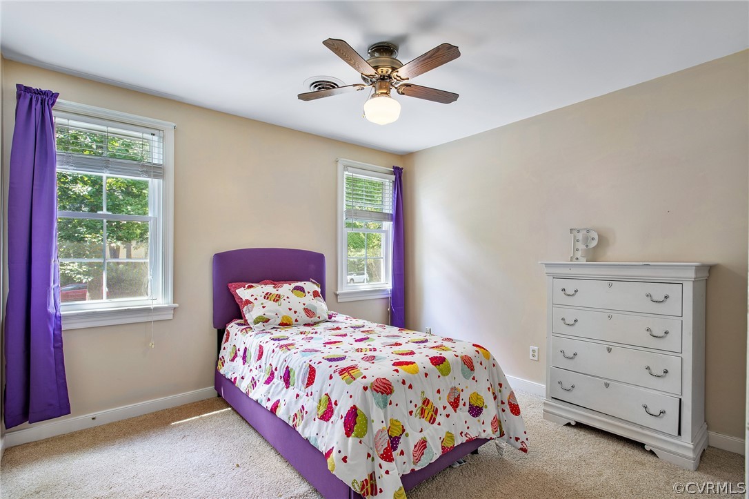 1213 Kingscross Road Midlothian, VA 23114 - Photo 28 of 39 a bedroom with a large bed and a window