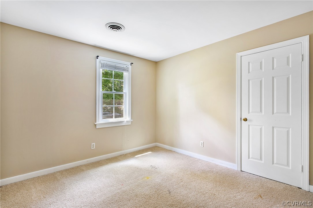 1213 Kingscross Road Midlothian, VA 23114 - Photo 30 of 39 an empty room with windows