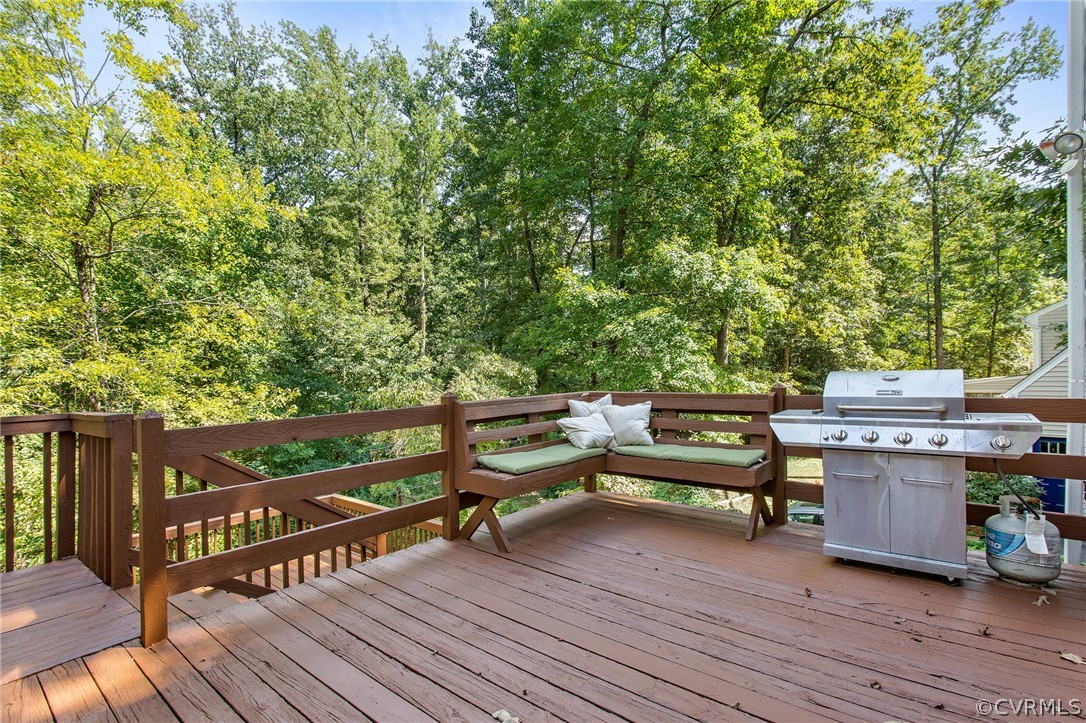 1213 Kingscross Road Midlothian, VA 23114 - Photo 33 of 39 a view of a deck with wooden floor and outdoor seating