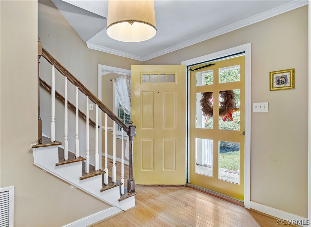 1213 Kingscross Road Midlothian, VA 23114 - Photo 5 of 39 a view of an entryway with wooden floor