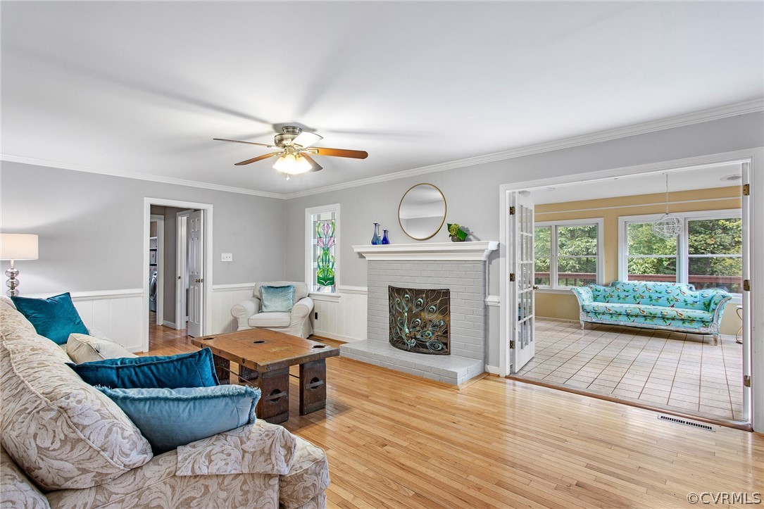 1213 Kingscross Road Midlothian, VA 23114 - Photo 7 of 39 a living room with furniture and a fireplace