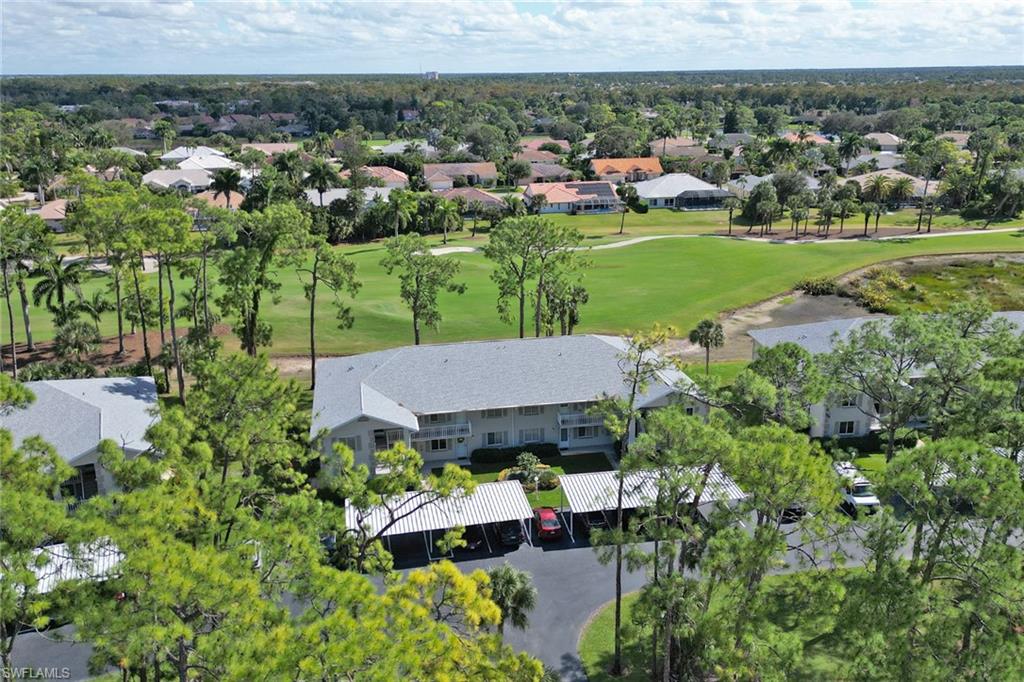 an aerial view of a house with a garden