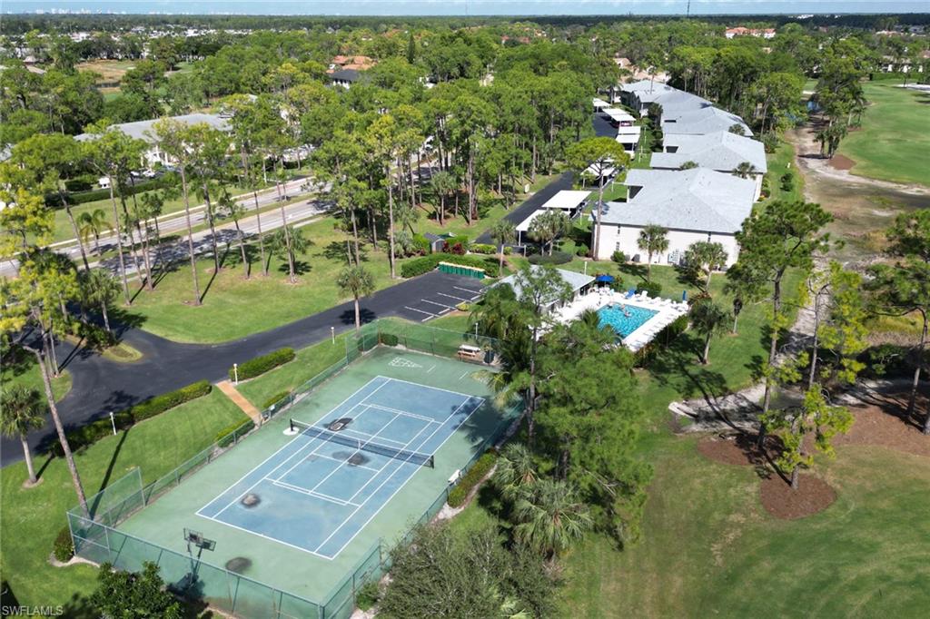 780 Augusta Boulevard, Unit C204 Naples, FL 34113 - Photo 29 of 40 an aerial view of residential house with outdoor space