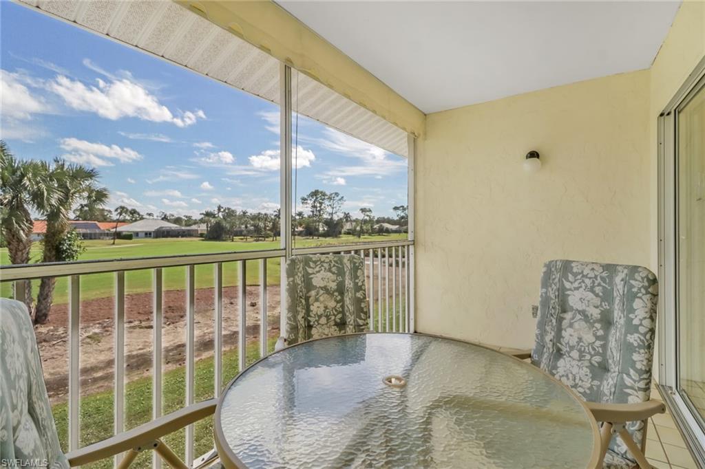 780 Augusta Boulevard, Unit C204 Naples, FL 34113 - Photo 4 of 40 a view of a porch