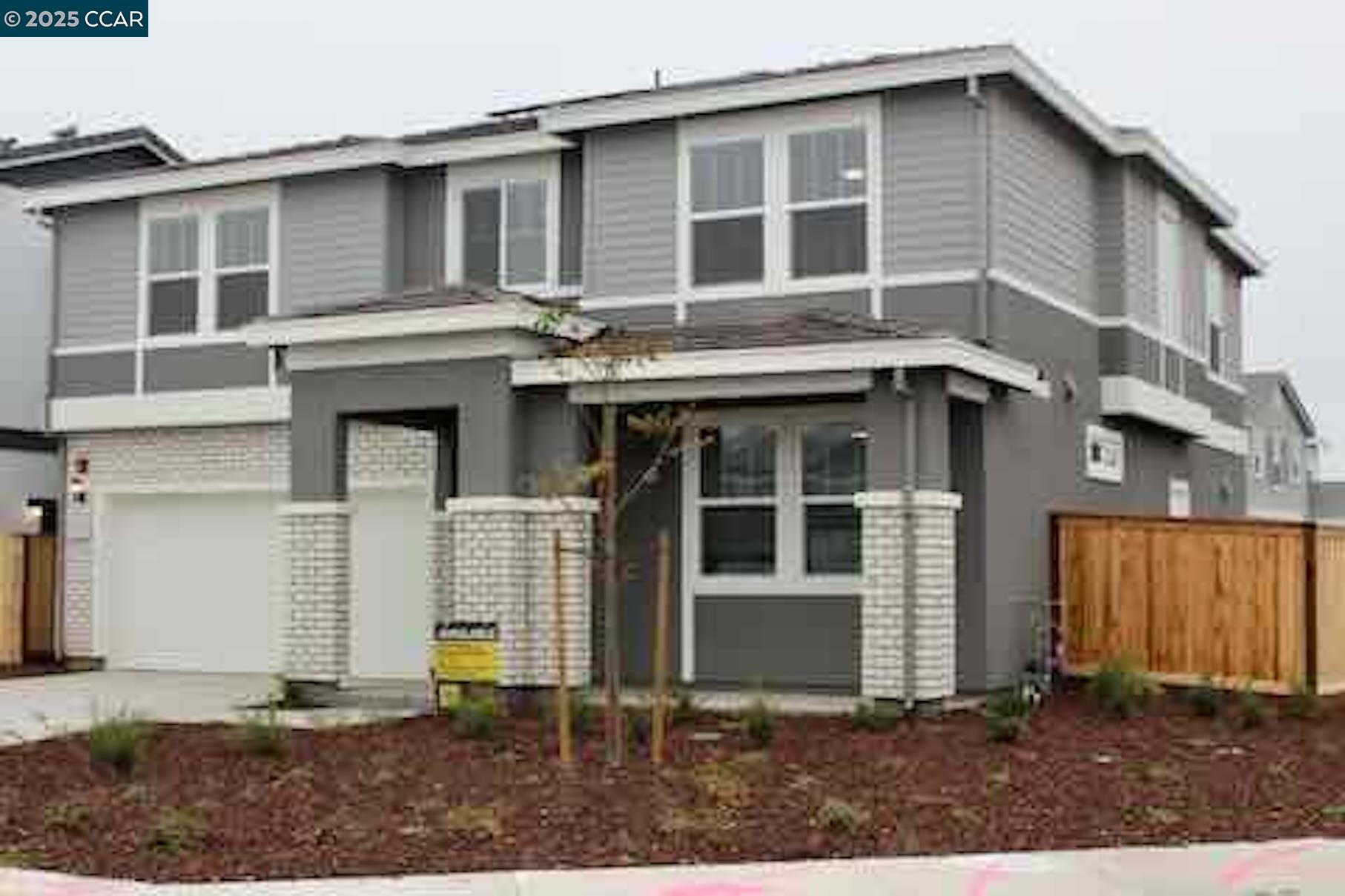 822 Engineer Circle Vacaville, CA 95687 - Photo 1 of 6 a front view of a house with a yard