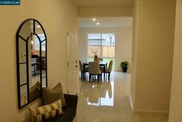 a view of living room and dining room