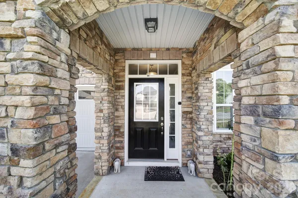 a front view of a building with a entryway