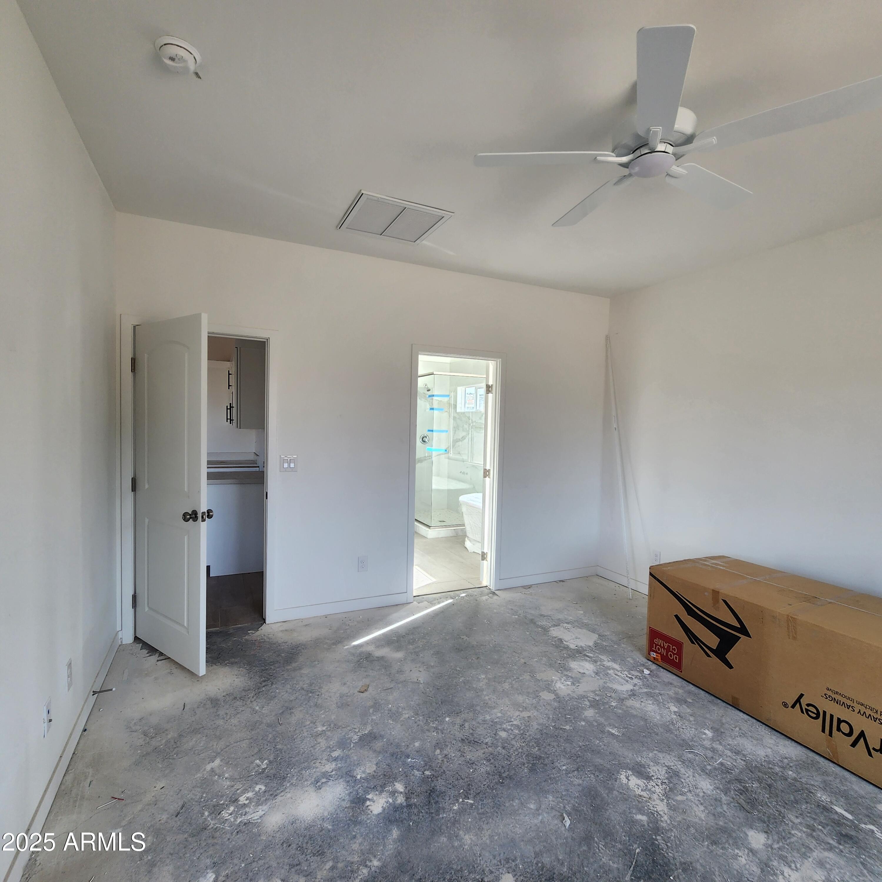 22216 West Skinner Road Wittmann, AZ 85361 - Photo 7 of 13 1732 MASTER BEDROOM