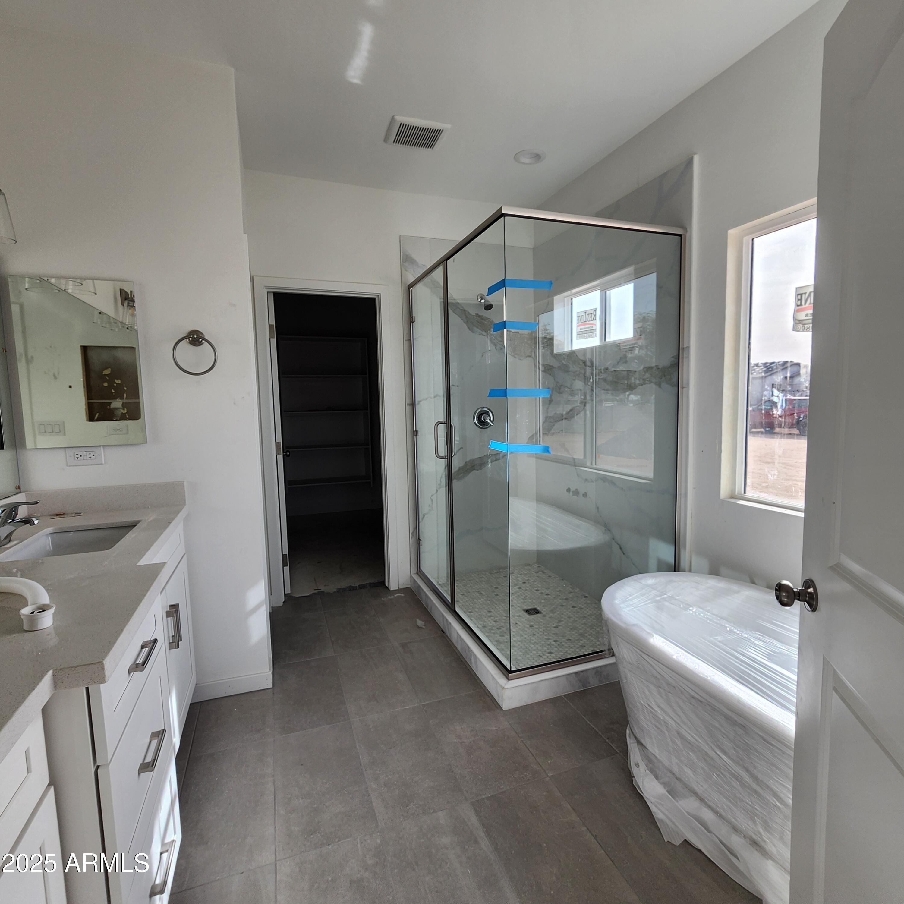 22216 West Skinner Road Wittmann, AZ 85361 - Photo 9 of 13 1732 MASTER BATH 2