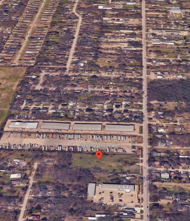 3333 Peachtree Road Balch Springs, TX 75180 - Photo 11 of 16 a view of a building with an outdoor space