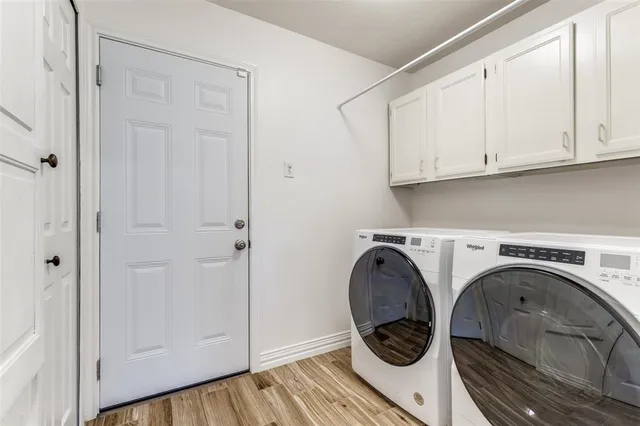 a view of utility room and washer dryer