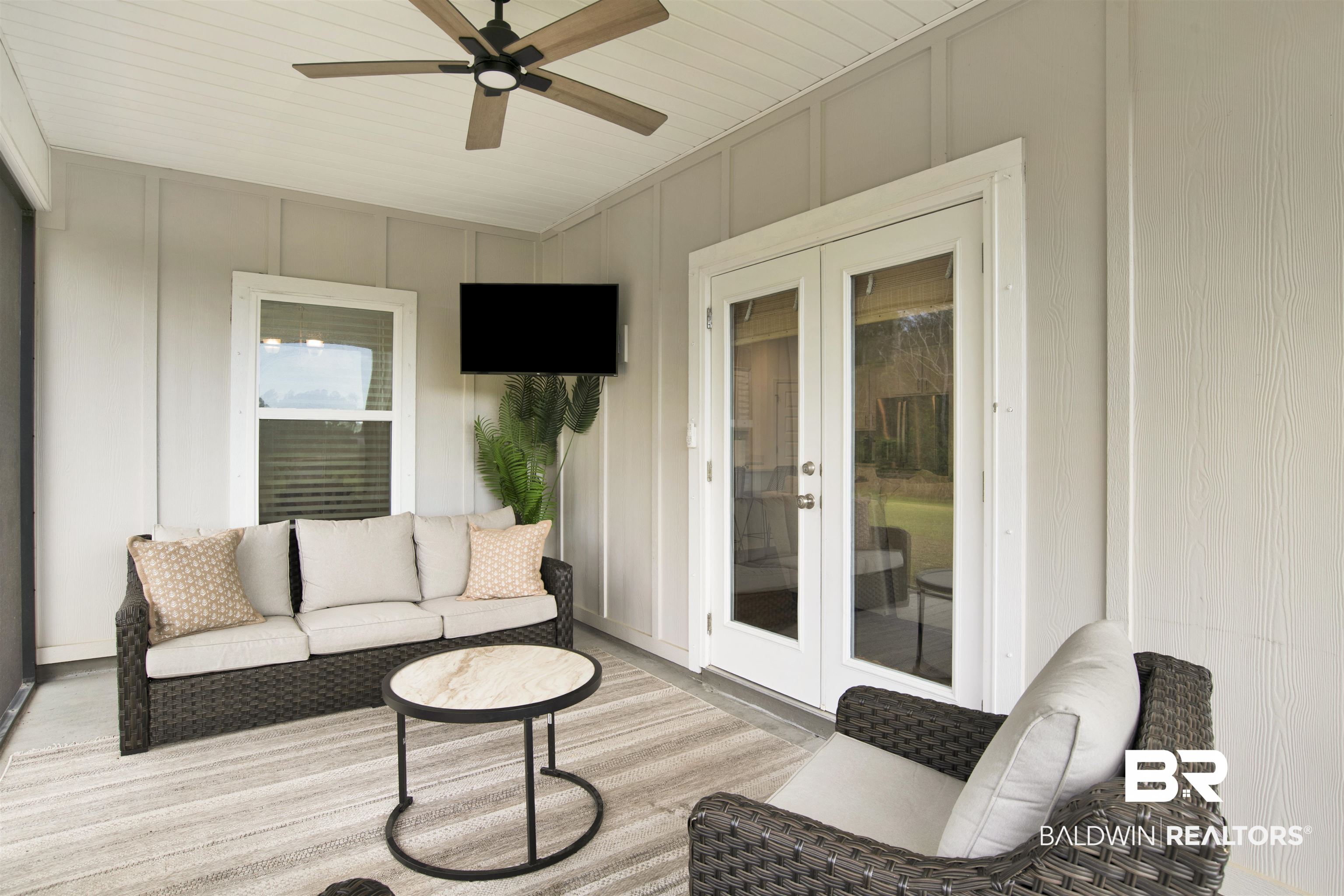 594 Shepard Street Gulf Shores, AL 36542 - Photo 32 of 51 Deck with french doors, an outdoor living space, and a ceiling fan