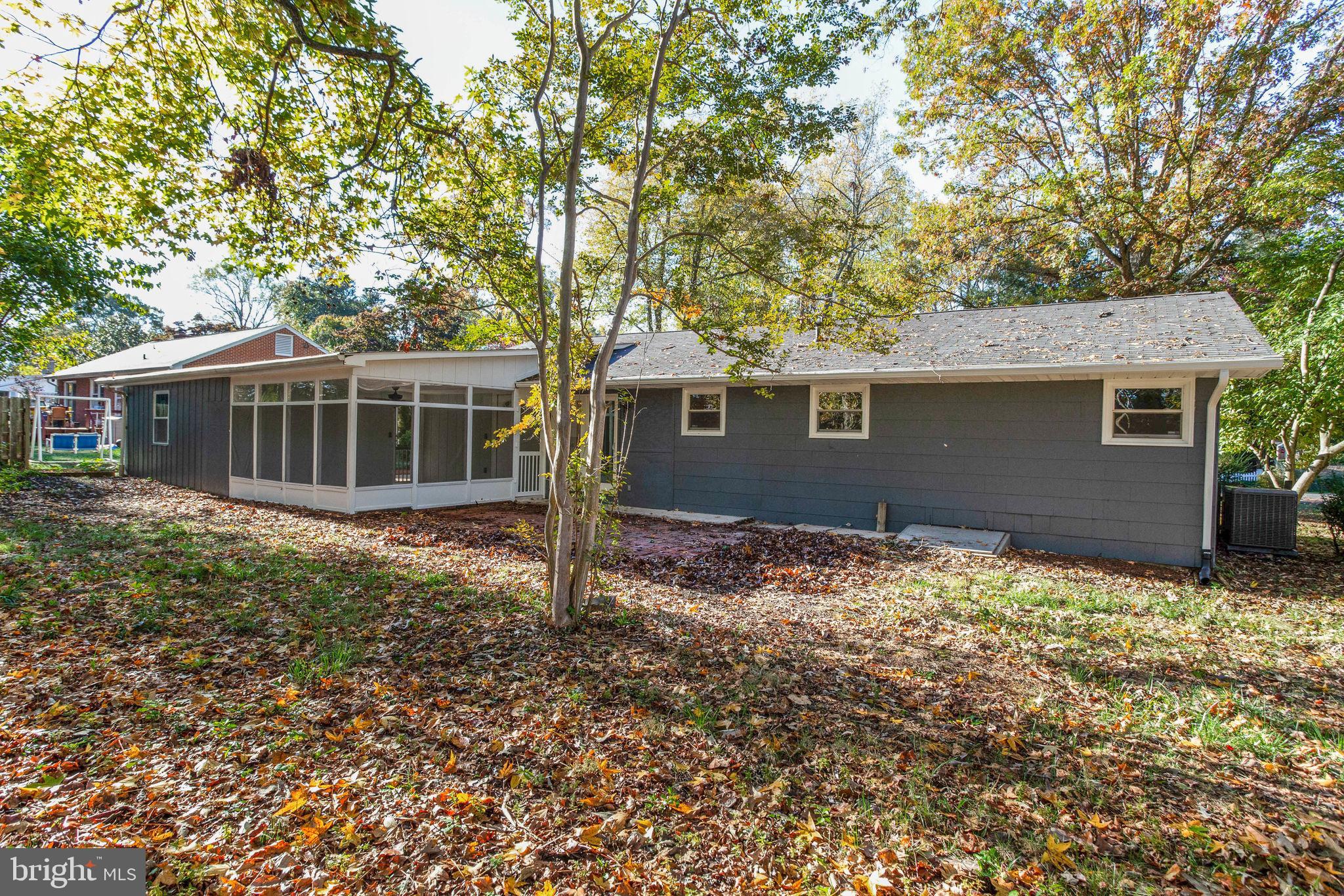 158 Calhoun Street Edgewater, MD 21037 - Photo 35 of 43 Rear of the house with privacy trees around
