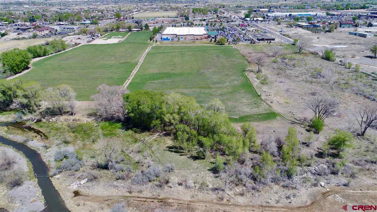 Tbd Tbd Montrose, CO 81401 - Photo 15 of 15 an aerial view of residential houses with outdoor space