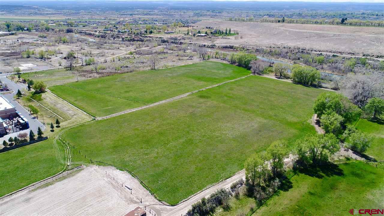 Tbd Tbd Montrose, CO 81401 - Photo 7 of 15 an aerial view of a houses with a yard