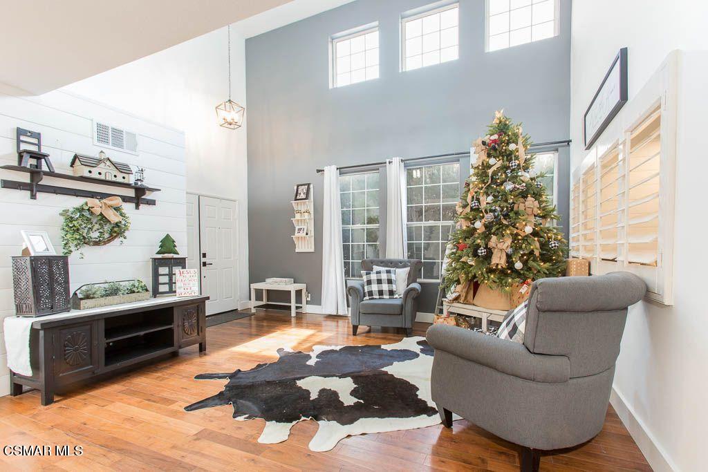 1752 Empty Saddle Road Simi Valley, CA 93063 - Photo 18 of 34 a living room with furniture and a large window