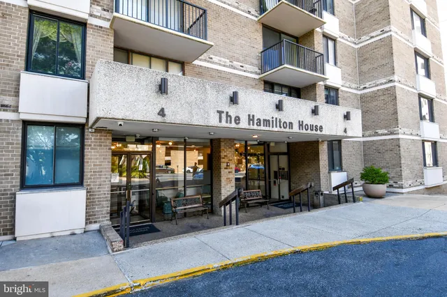 a view of a building with sitting area
