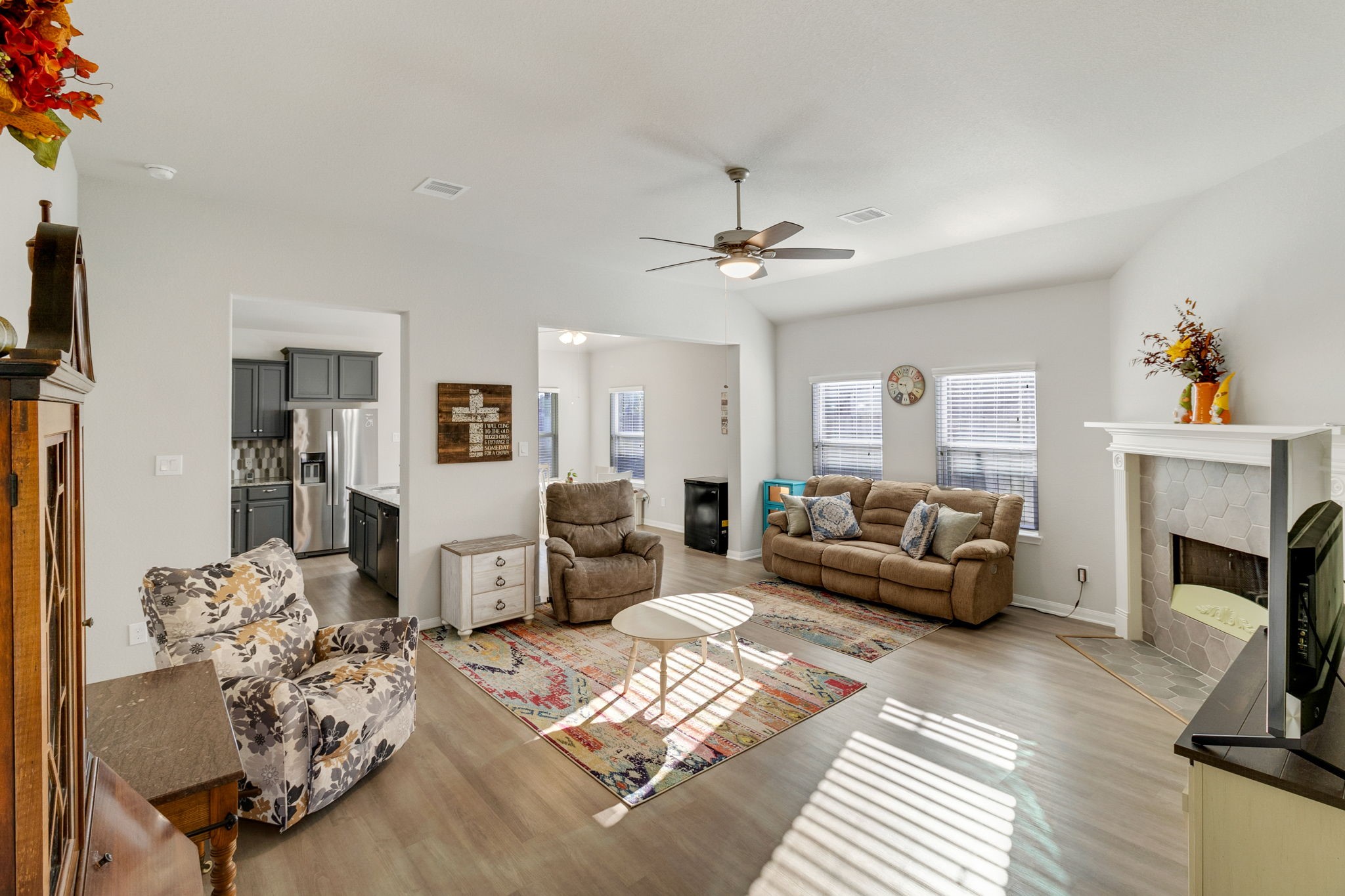 20232 Torrey Pines Lane Cleveland, TX 77327 - Photo 10 of 33 a living room with furniture and a fireplace