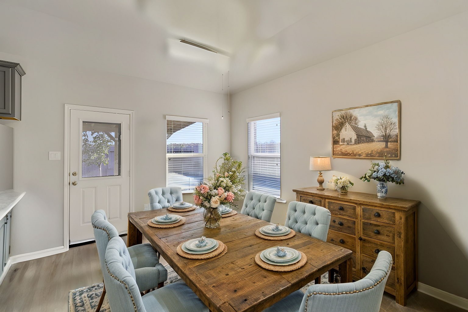 20232 Torrey Pines Lane Cleveland, TX 77327 - Photo 11 of 33 a view of a dining room with furniture and wooden floor