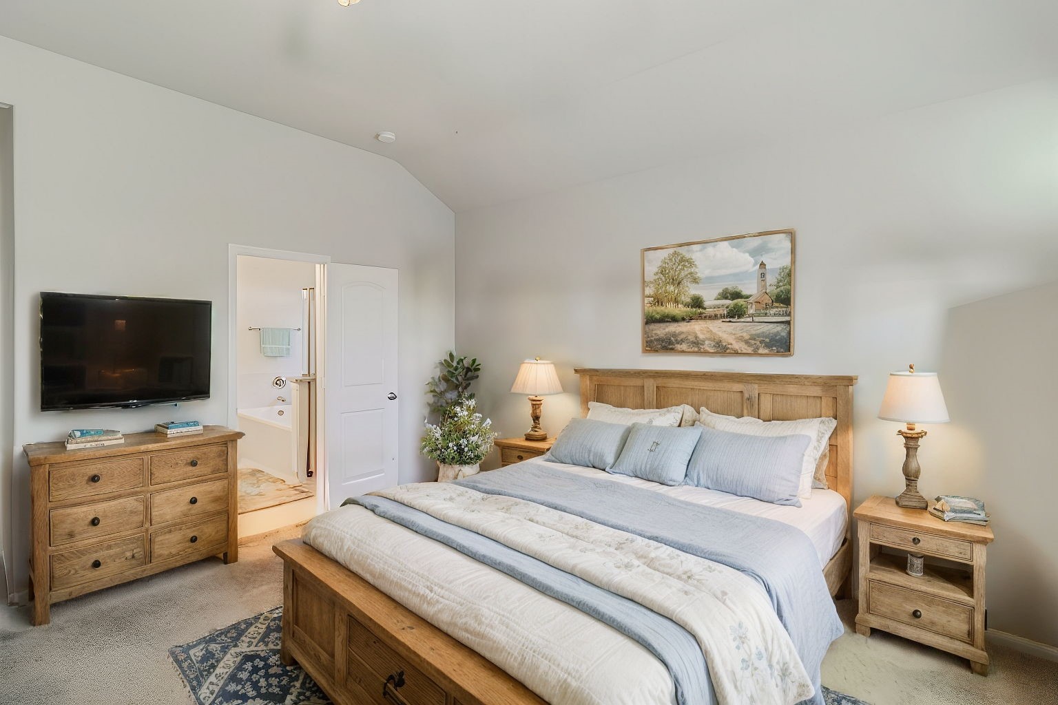 20232 Torrey Pines Lane Cleveland, TX 77327 - Photo 17 of 33 a bedroom with a bed and a television