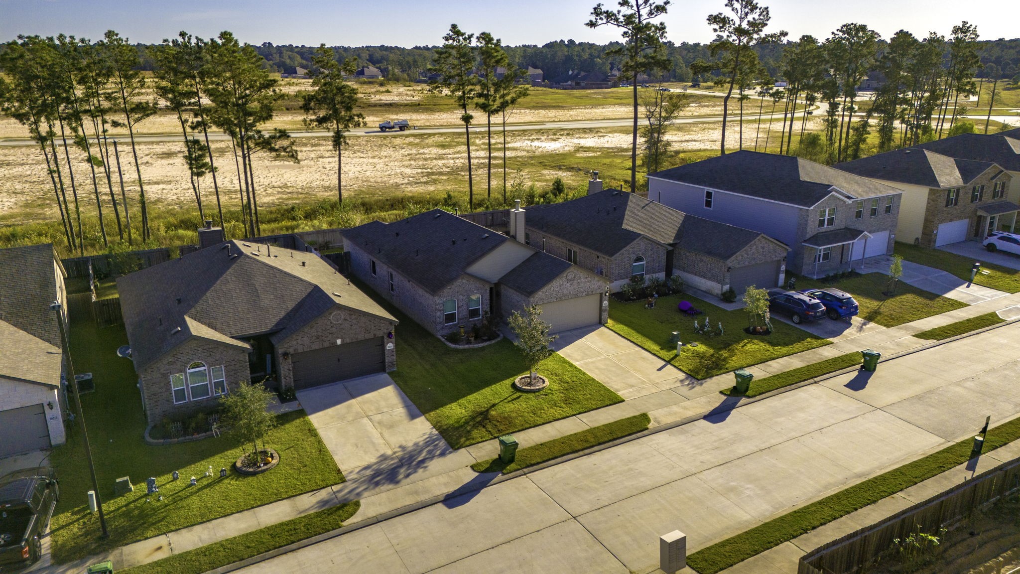 20232 Torrey Pines Lane Cleveland, TX 77327 - Photo 2 of 33 a view of a house with pool and ocean view